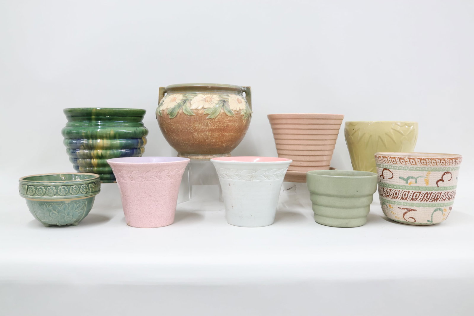 Roseville Dahlrose Style Jardiniere: Roseville Dahlrose Style Jardiniere Unmarked Roseville Dahlrose Style Jardiniere. Together with Yellowware Beehive style planter, Robinson Ransbottom stoneware Jardiniere, Robinson Ransbottom Desert M