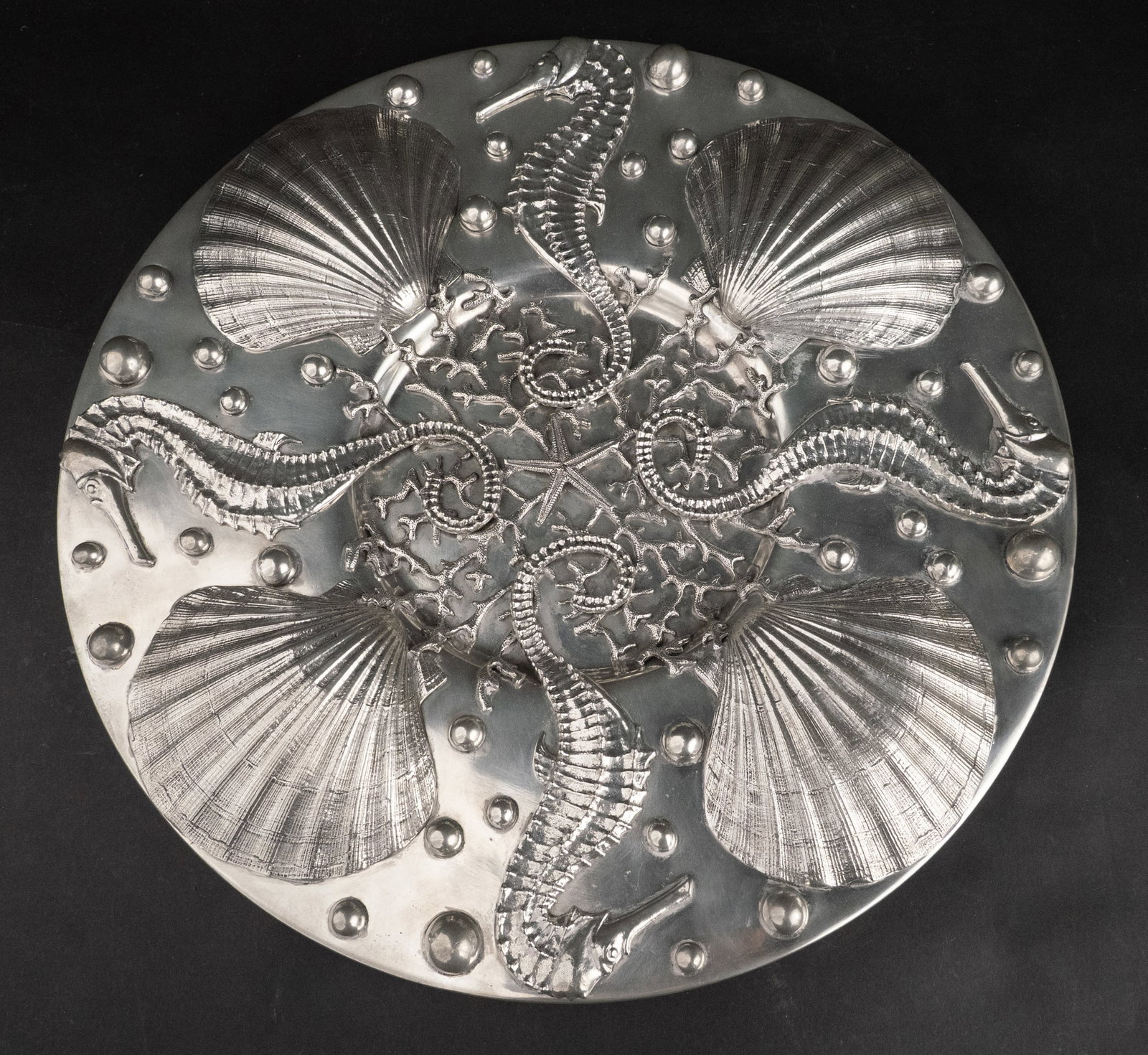 Figura Piero Seahorse and Seashell Pewter Plaque: Figura Piero Seahorse and Seashell Pewter Plaque Hanging circular plaque of impressive size. 18 in. (45.7 cm.)