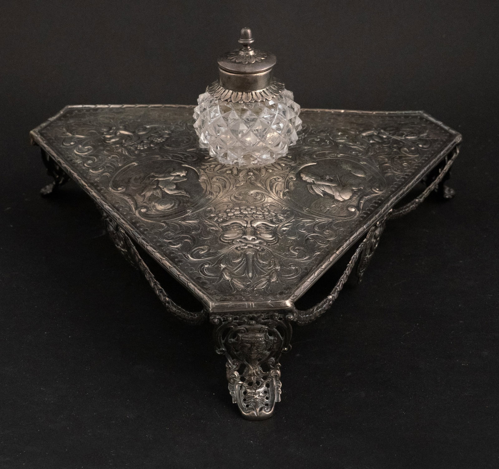 English Silver Triangular Inkwell: English Silver Triangular Inkwell Marks for English, London, 1777, with glass inkwell possibly of a later date. Approx. 22 t.o. 2 1/2 x 11 in. (6.4 x 27.9 cm.)