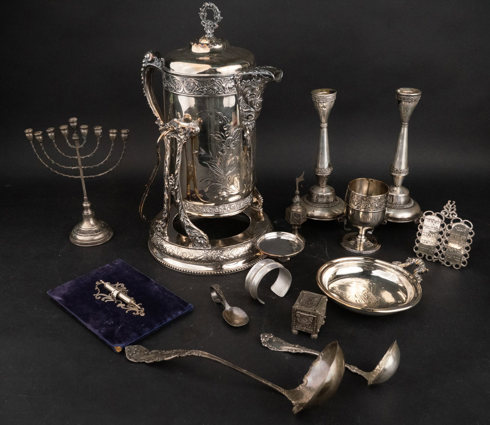 Judaic Silver And Holloware: Judaic Silver And Holloware Including: a spice tower, a Hazorfim 925 menorah, 8"h, possibly a William B. Meyers of Newark, NJ mezuzah, a pair of candlesticks, a spice box, a bracelet, a baby spoon, a