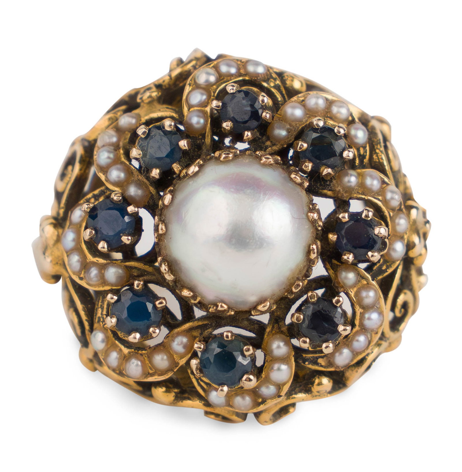 Large 14K Gold Cocktail Ring: Large 14K Gold Cocktail Ring With large pearl and 8 sapphires with seed pearls. Ring size 7.25 Total weight approx. 8.35 dwt 1 1/4 x 1 x 1 in. (3.2 x 2.5 x 2.5 cm.)