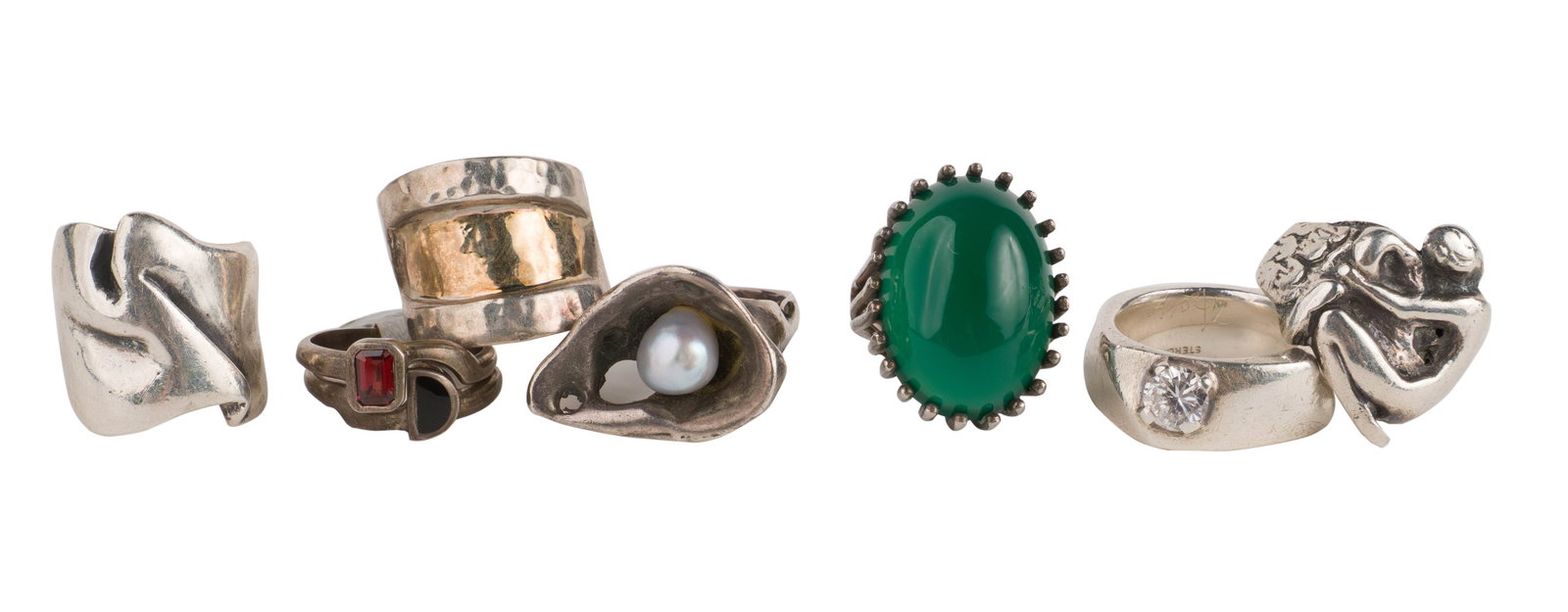 Five Modernist Sculptural Silver Rings: Five Modernist Sculptural Silver Rings Together with a silver and jade ring and a pair of lovers rings.