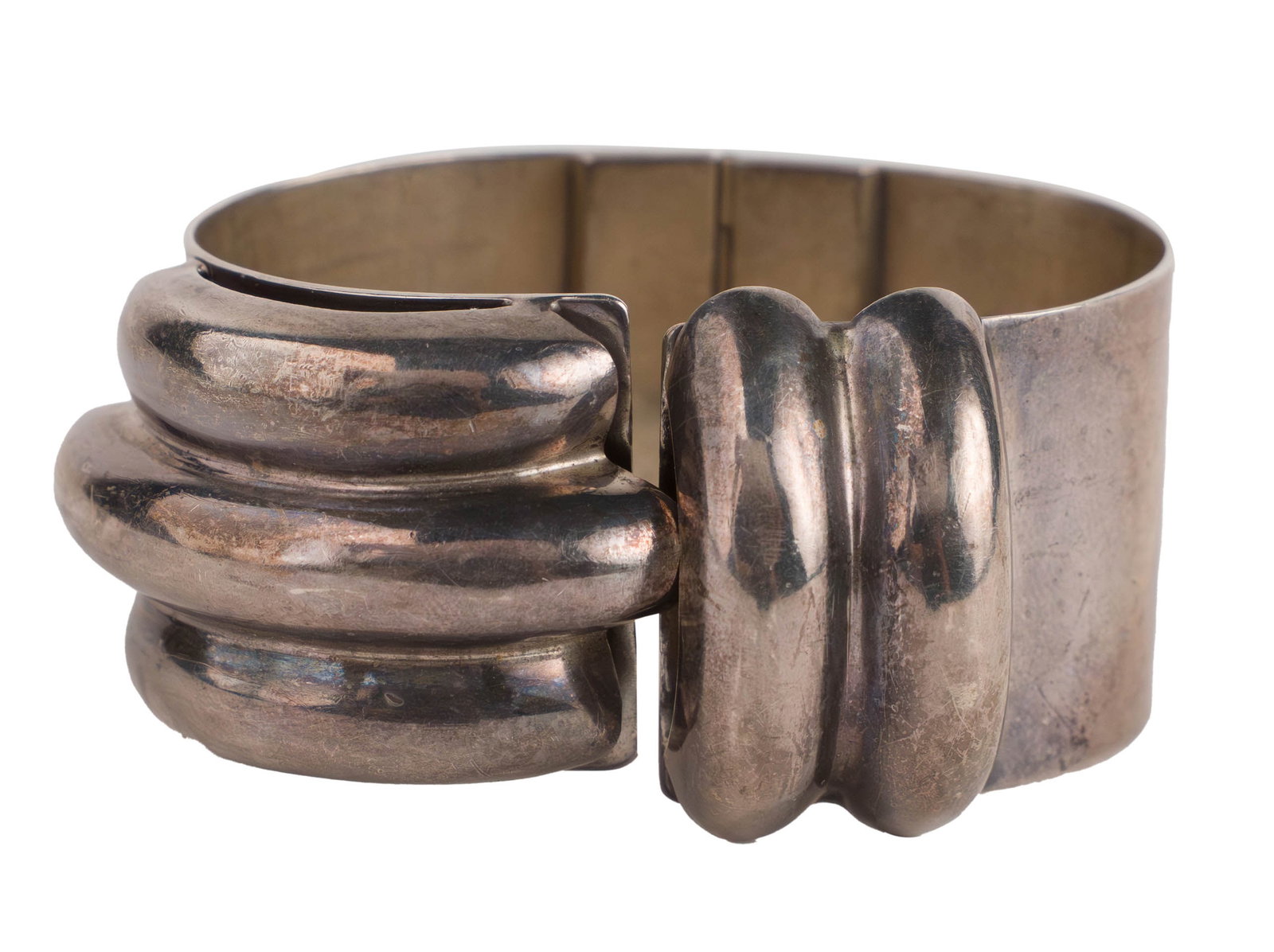 Mexican Silver Modernist Clasp Bracelet: Mexican Silver Modernist Clasp Bracelet c. 1970, marked "Mexico" and "925". Total weight approx. 48.8 dwt 2 1/4 x 3 in. (5.7 x 7.6 cm.)