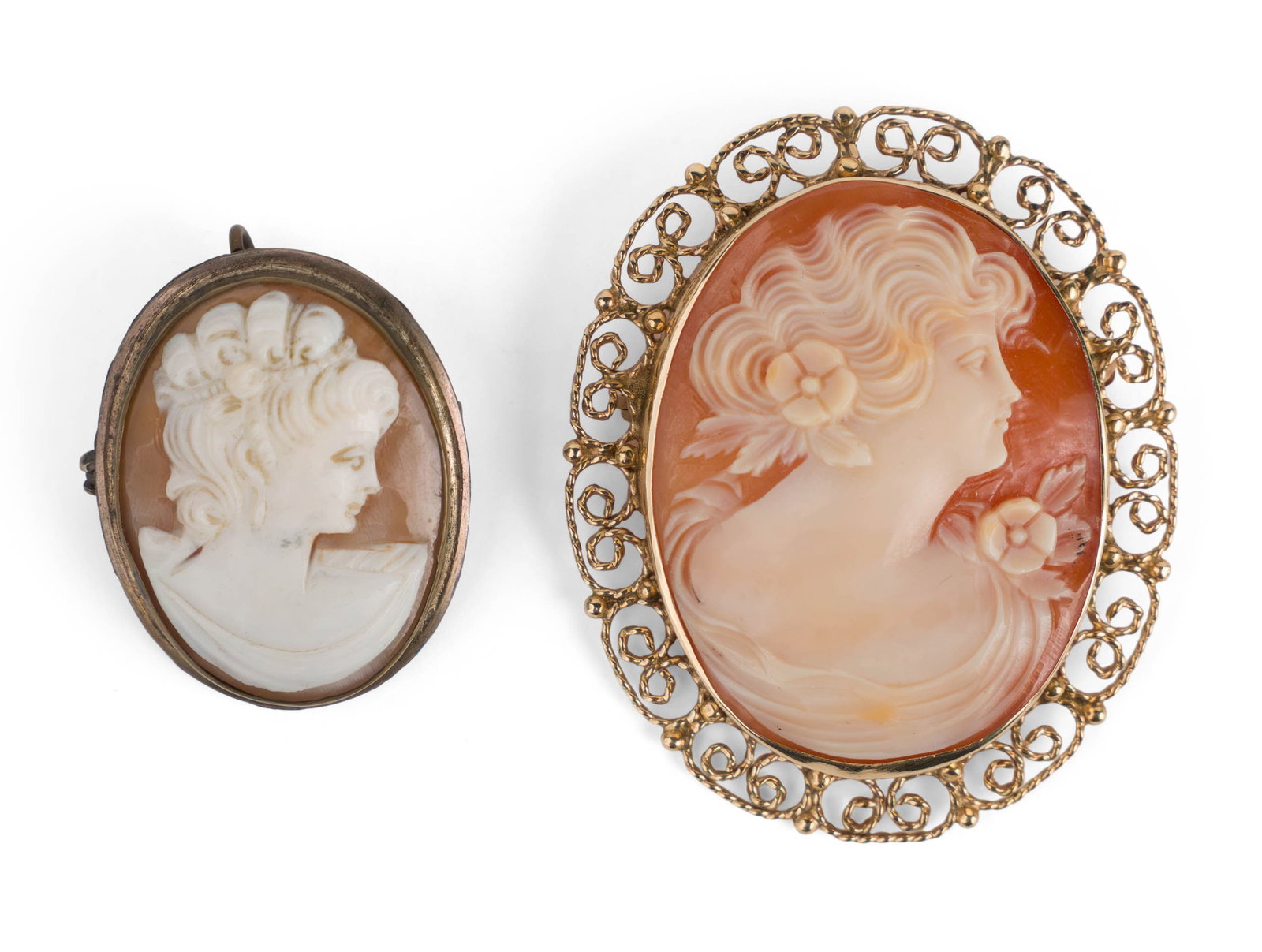 Two Cameos: Two Cameos The larger mounted with a 14K gold frame. 1 x 7/8 in. (2.5 x 2.2 cm.), and 1 3/4 x 1 1/2 in. (4.4 x 3.8 cm.)