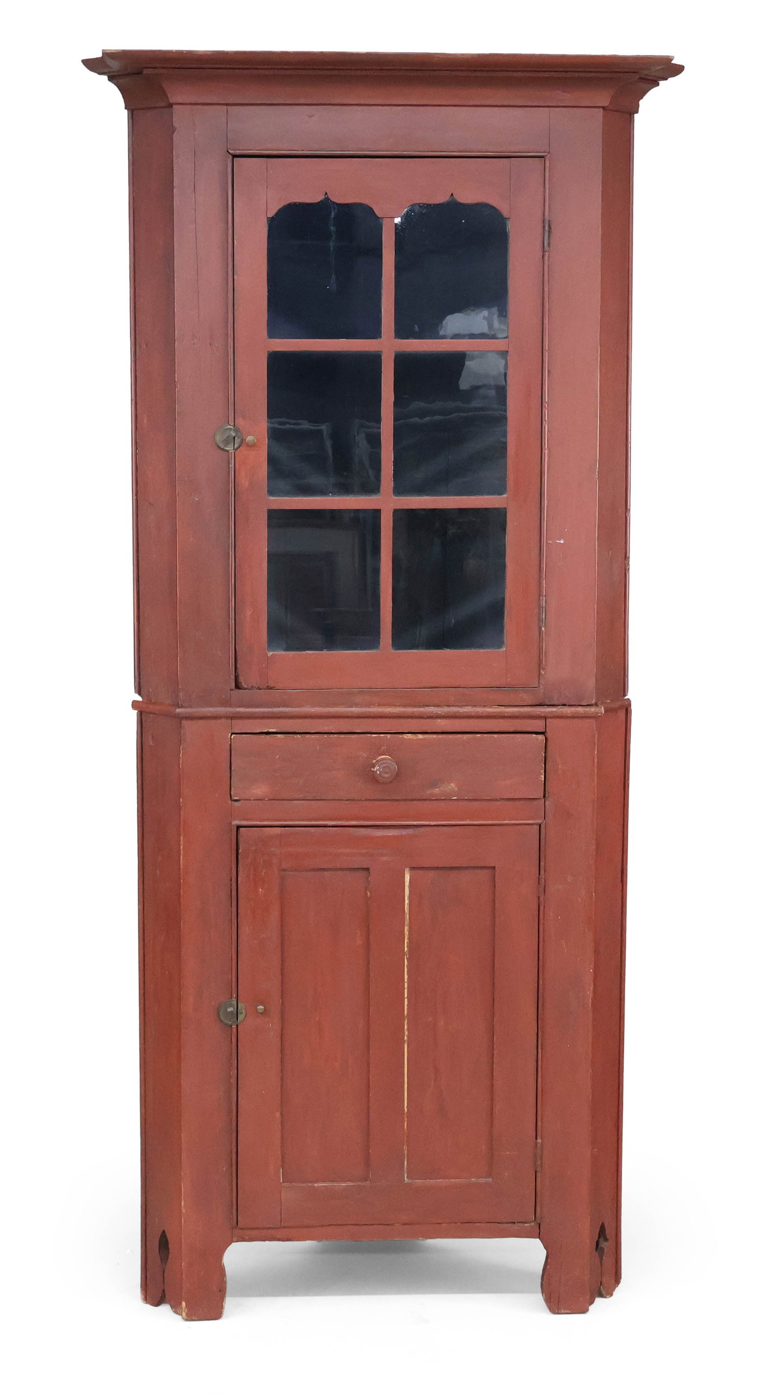 Red-Stained Pine Two-Piece Corner Cupboard: Red-Stained Pine Two-Piece Corner Cupboard New England, 19th C. Provenance: Property of a Private Bernardsville, NJ Collection 84 1/2 x 34 x 24 1/2 in. (214.6 x 86.4 x 62.2 cm.), Cornice 40 in. (101.6