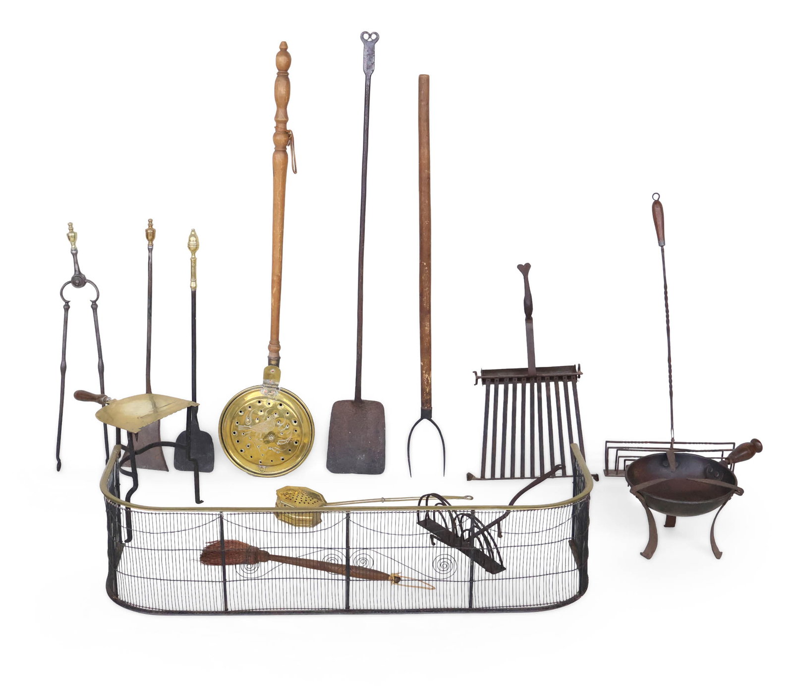 Large Group of Fireplace and Kitchen Equipment: Large Group of Fireplace and Kitchen Equipment Including, a brass and iron fender, a bedwarmer, toasters, footman, grilles, shovels, and tongs. Approx. 14 pieces Provenance: Property of a Private