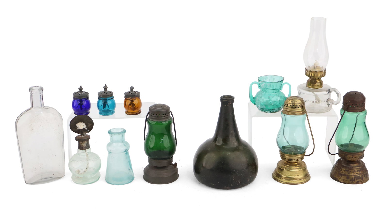 Group of Vintage Glass Table Articles: Group of Vintage Glass Table Articles Including, oil lamps, and bottles. Provenance: Property of a Private Bernardsville, NJ Collection Largest: 8 x 3 3/4 in. (20.3 x 9.5 cm.)
