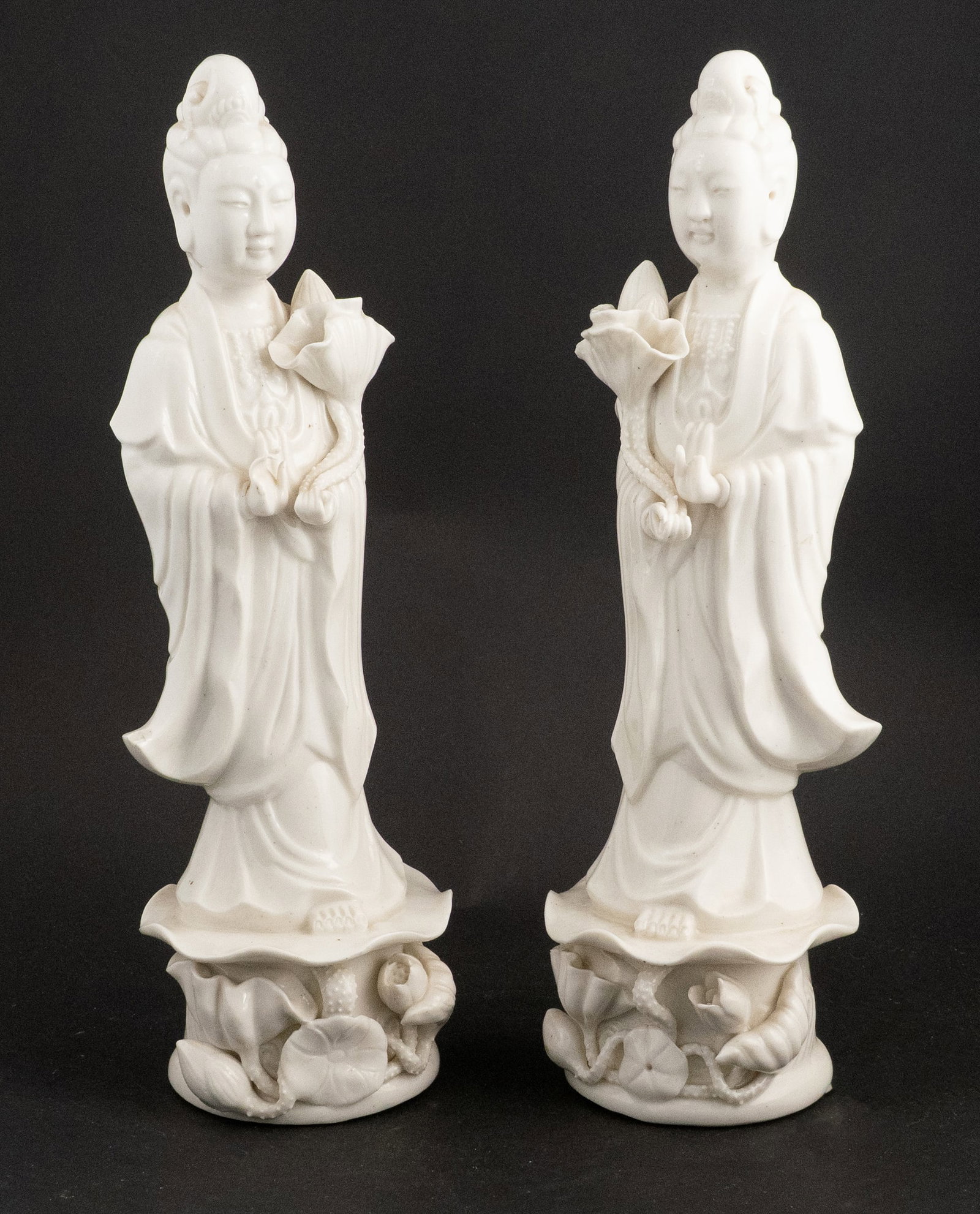 Two Chinese Blanc de Chine Figures of Guanyin: Two Chinese Blanc de Chine Figures of Guanyin 20th C. 14 1/2 x 4 1/2 x 4 3/4 in. (36.8 x 11.4 x 12.1 cm.)