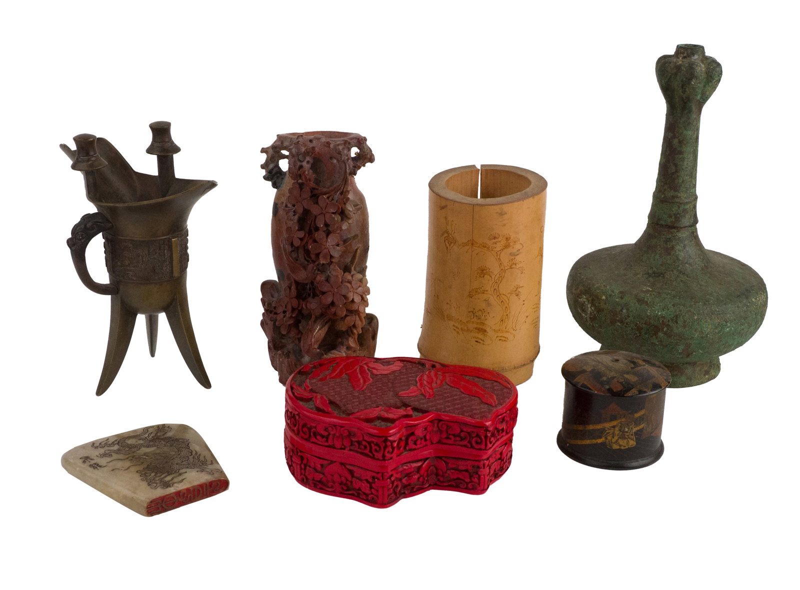 Chinese Bronze Jue Vessel: Chinese Bronze Jue Vessel Together with a carved hardstone vase, a carved red lacquer box, a incised hardstone dish, a gold and black lacquer box, a carved bamboo vase, and a metal vase. 7 pieces
