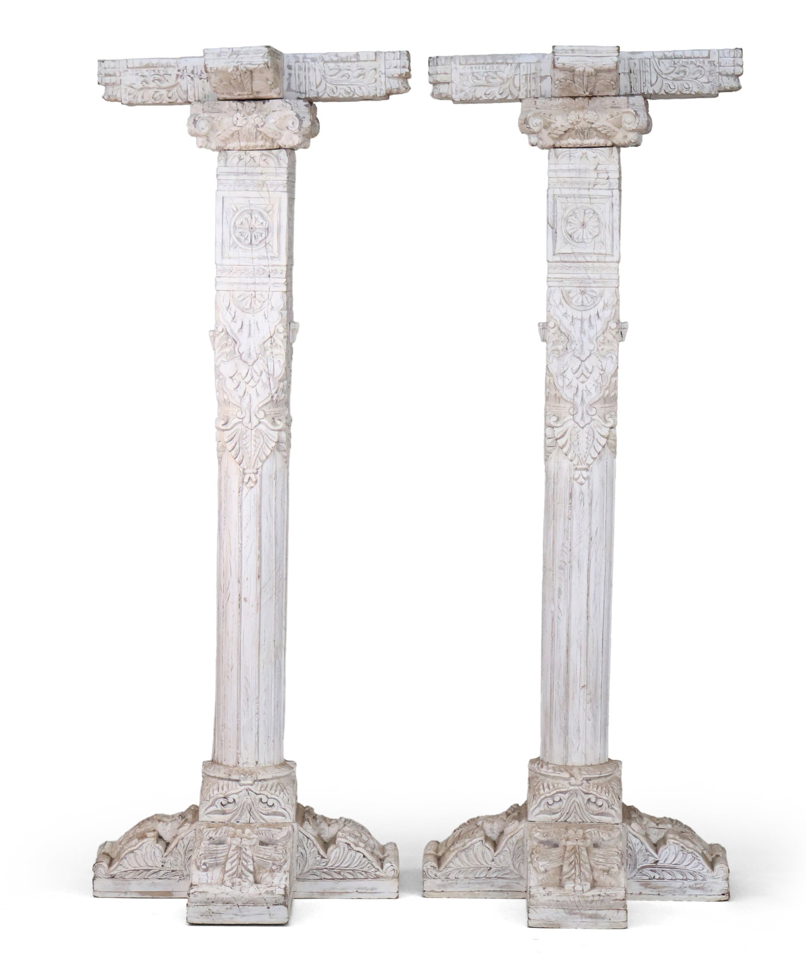 Pair of Asian White Painted Carved Wood Columns: Pair of Asian White Painted Carved Wood Columns In multiple sections. Approximately: 86 x 31 x 20 in. (218.4 x 78.7 x 50.8 cm.)