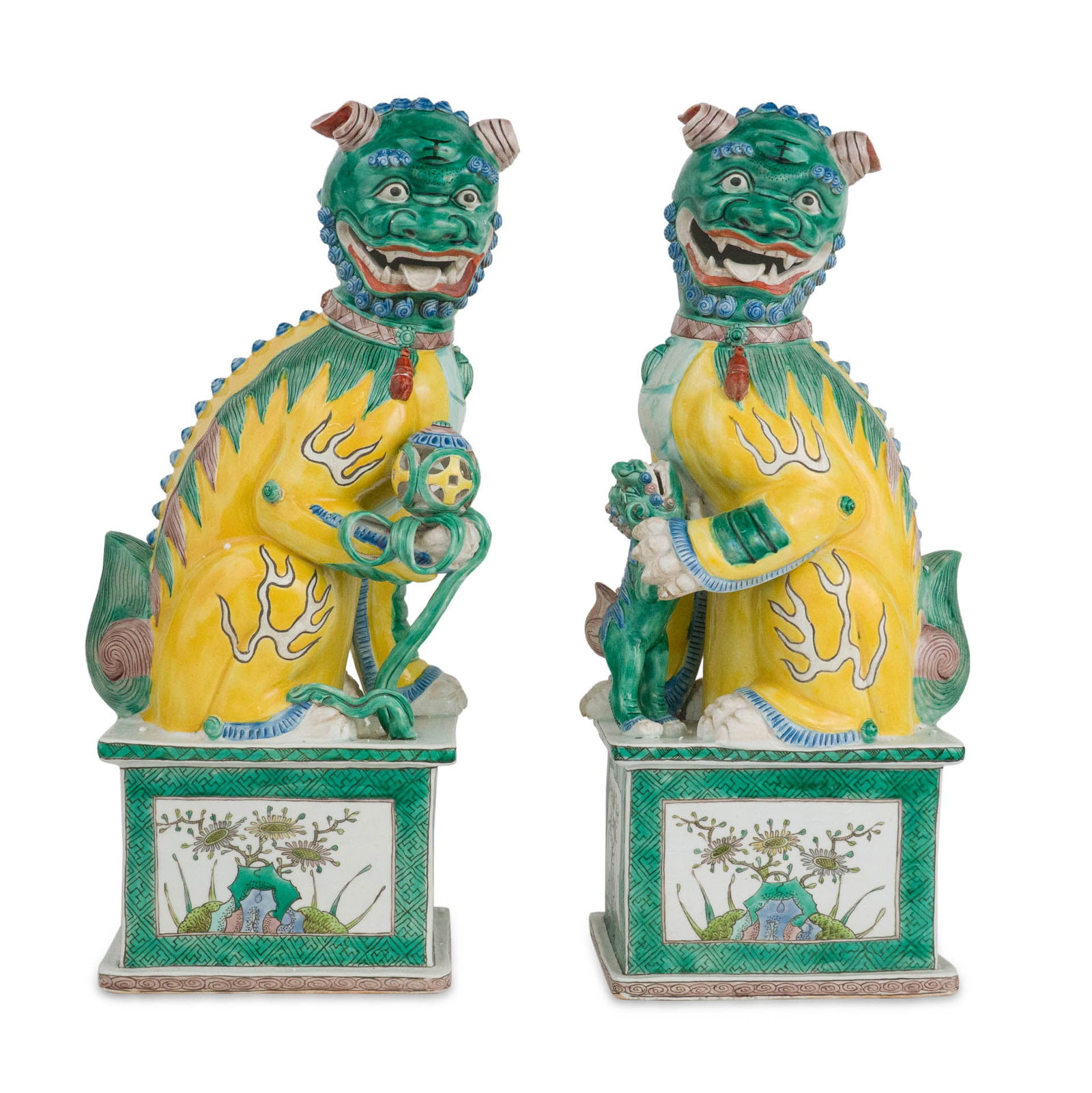 Pair of Chinese Sancai Fu Lion Ornaments: Pair of Chinese Sancai Fu Lion Ornaments 19th/20th C. 18 x 5 3/4 x 7 in. (45.7 x 14.6 x 17.8 cm.)