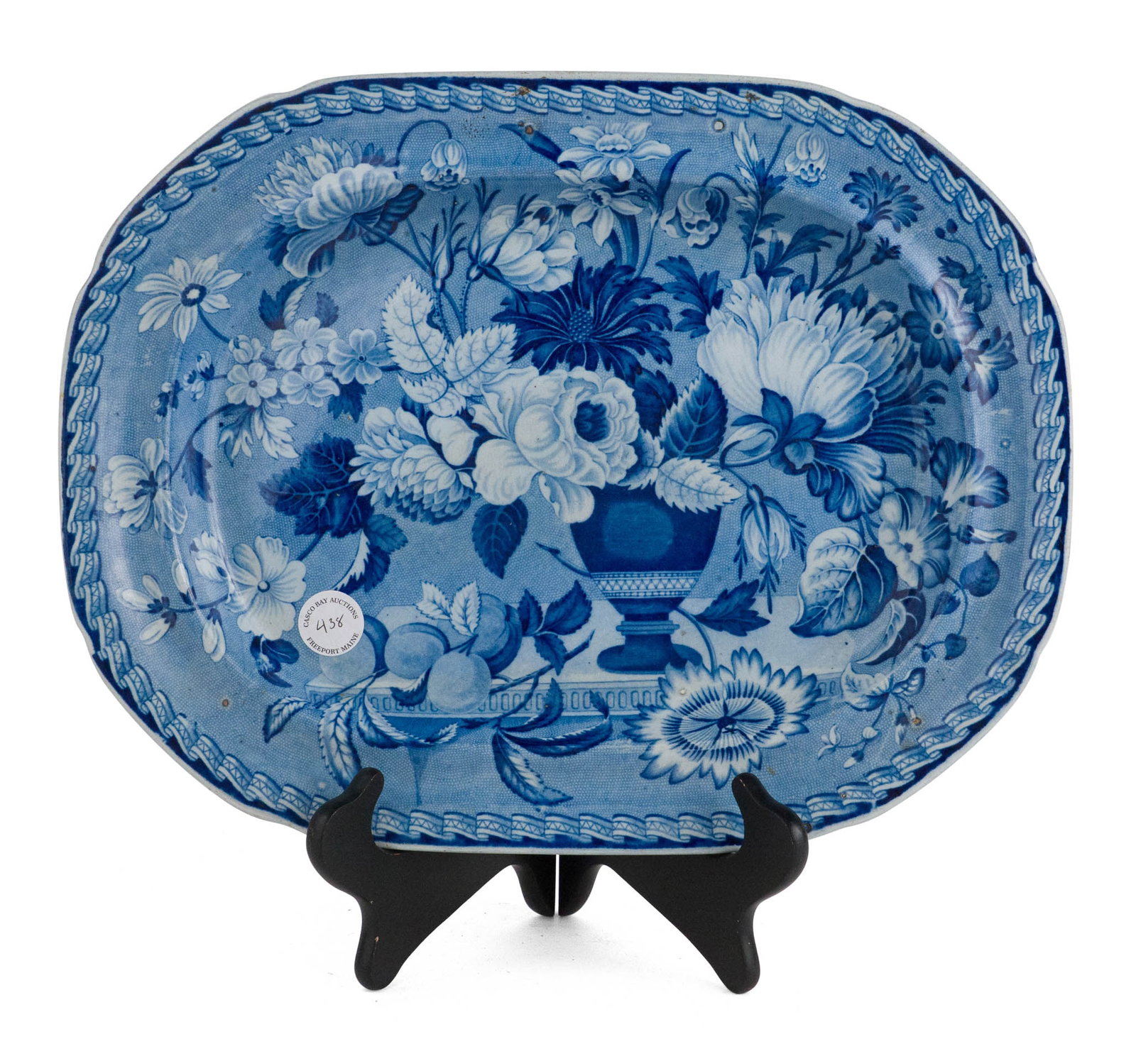 Staffordshire Blue Transfer-Printed Platter: Staffordshire Blue Transfer-Printed Platter Depicting a vase filled with an abundant array of flowers, with fruit resting on the table below, impressed numeral "14." Provenance: Casco Bay Auctions,
