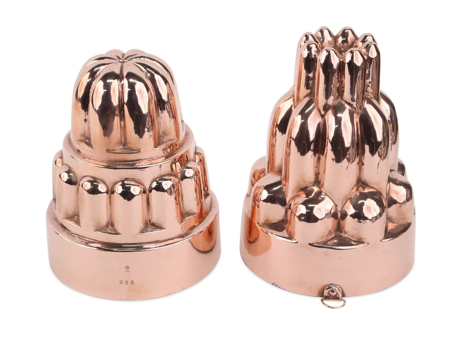 Two Large English Copper Molds: Two Large English Copper Molds Second-half 19th C. The taller stamped 1 (pattern #1). The second stamped "225" with a cross. Provenance: Eve Stone Antiques, LTD., Woodbridge, CT; Property from a