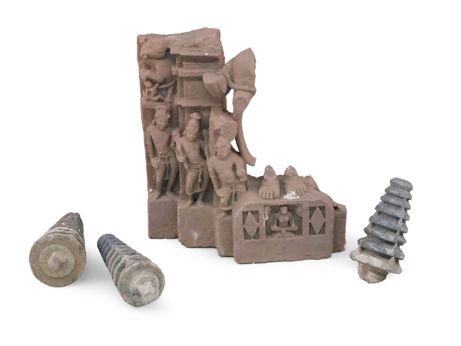 Indian Sandstone Carving Fragment: Indian Sandstone Carving Fragment Together with three carved stone spire fragments. 4 pieces Largest: 25 x 23 x 10 in. (63.5 x 58.4 x 25.4 cm.)