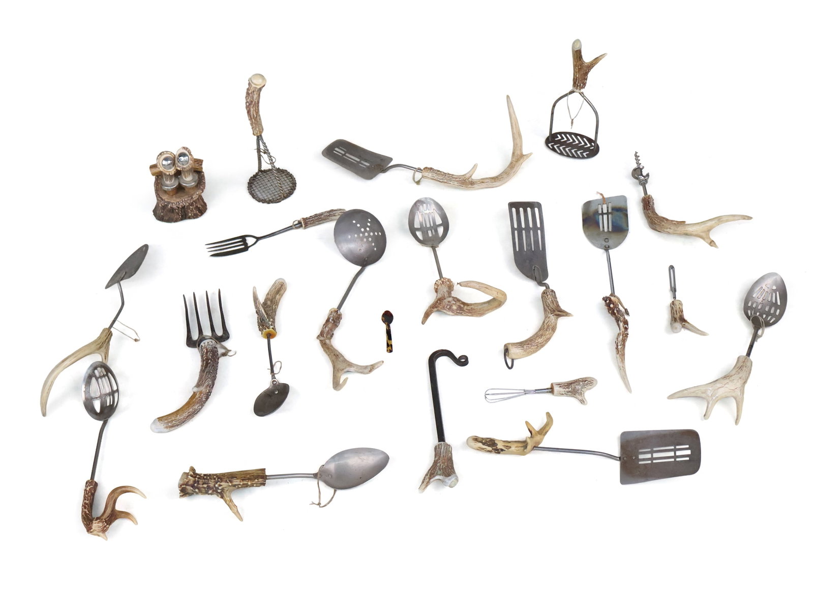 Group of Antler Handled Kitchen Utensils: Group of Antler Handled Kitchen Utensils 20th C. including, spatula, slotted spoons, bar tools, and mashers. Appx. 25 pieces