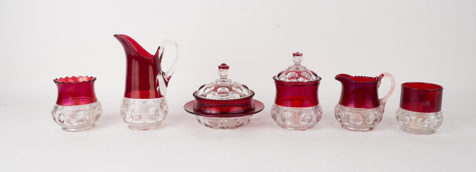 Six Ruby and Clear Pressed Glass Table Articles - 8