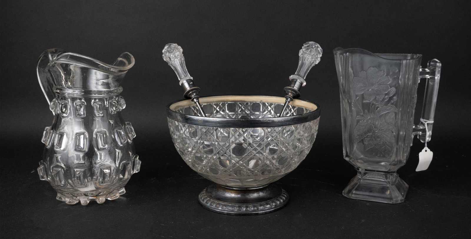 Henniger & Co. Cut Glass and Silver Plated Salad Bowl and Servers: Henniger & Co. Cut Glass and Silver Plated Salad Bowl and Servers Late 19th C. Together with a pressed glass pitcher, American, 1880-1910 and a clear pattern-molded glass pitcher, American, 19th C. 5