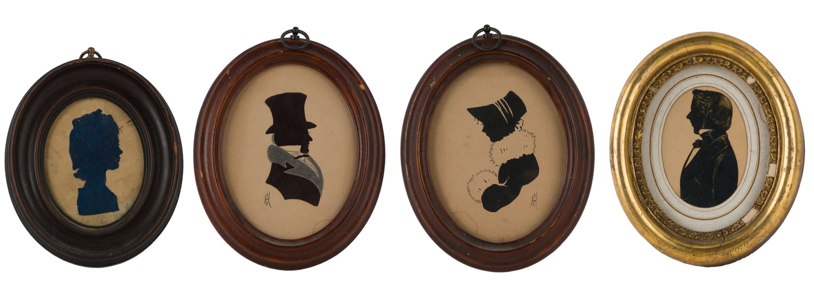 Four Oval Framed Silhouettes: Four Oval Framed Silhouettes Two gentlemen and two ladies, some embellished. Largest Sight: 4 x 3 in. (10.2 x 7.6 cm.), Frame: 5 1/2 x 4 1/2 in. (14 x 11.4 cm.)