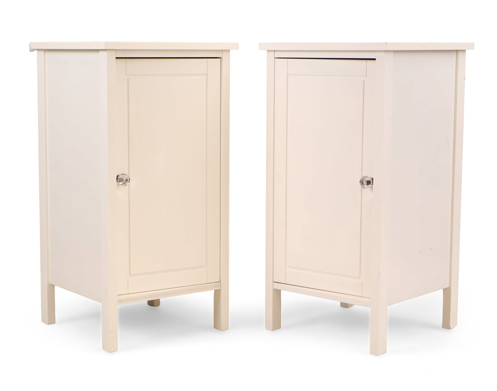 Pair of White Ikea Hemnes One Door Nightstands: Pair of White Ikea Hemnes One Door Nightstands 21st C. Lacking shelves. 29 1/2 x 15 3/8 x 15 3/8 in. (74.9 x 39.1 x 39.1 cm.)