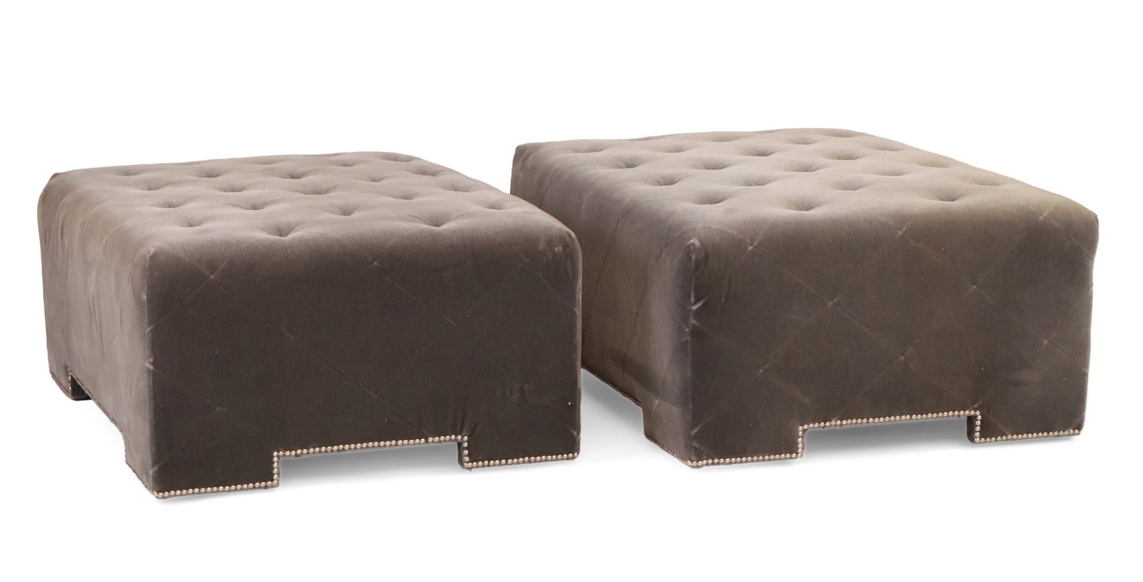 Pair of Modern Grey-Upholstered Ottomans: Pair of Modern Grey-Upholstered Ottomans On casters. 16 1/4 x 41 x 29 1/2 in. (41.3 x 104.1 x 74.9 cm.)
