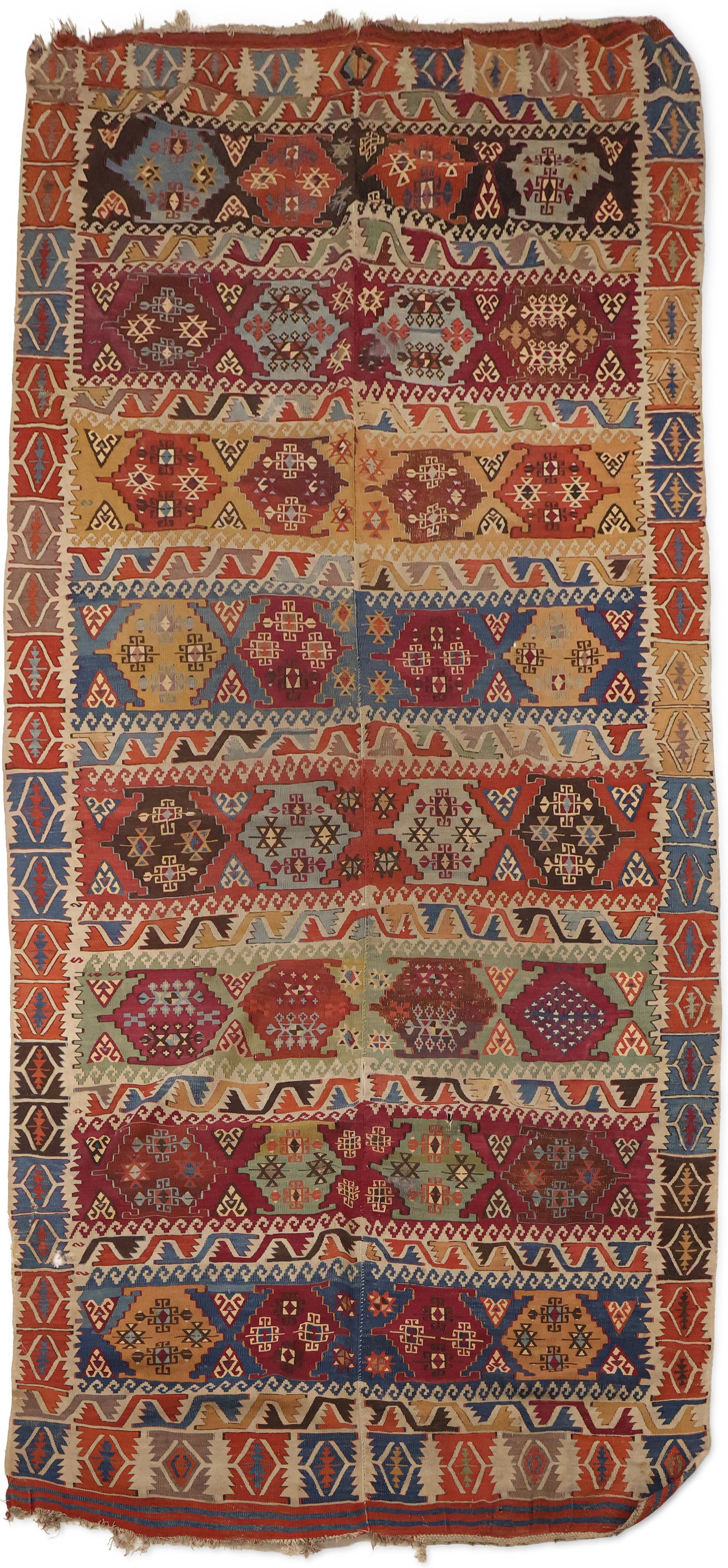 Turkish Kilim: Turkish Kilim Central Anatolia, first quarter 20th C. Areas of wear, stains, dog-eared corner, small hole(s) 126 x 62 in. (320 x 157.5 cm.)