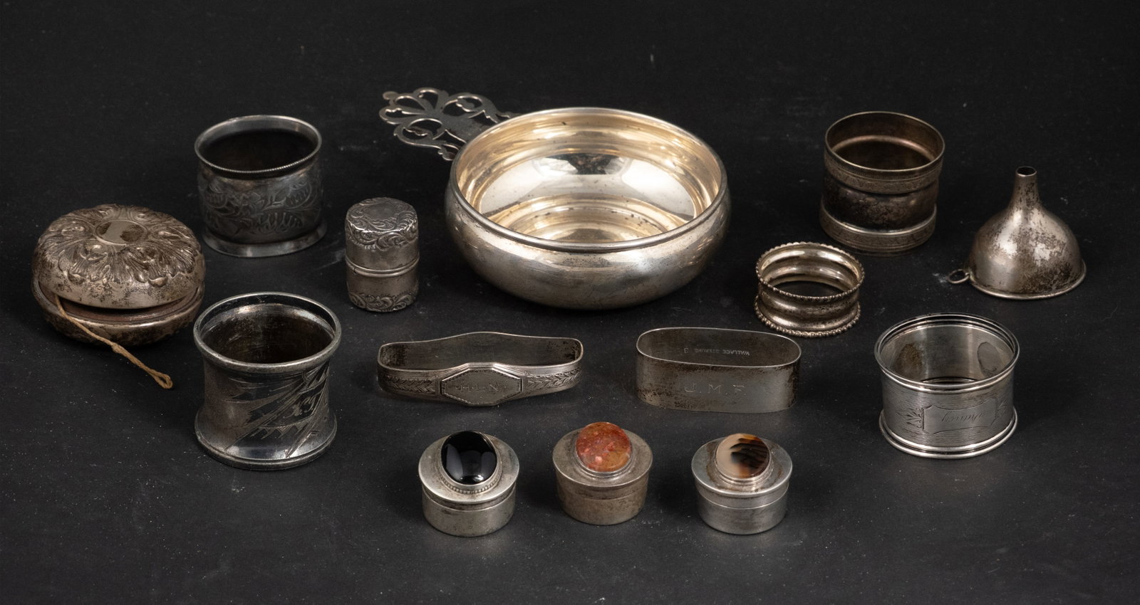 Vintage Gorham Sterling and Steel YoYo: Vintage Gorham Sterling and Steel YoYo Not weighed. Together with a sterling silver thread box, a sterling porringer, three sterling silver napkin rings, and a sterling funnel. Approx. 5 t.o. Also