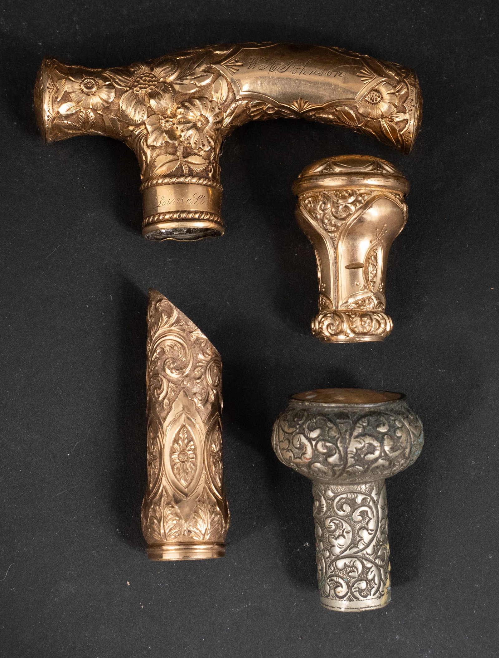 Four Vintage Cane Handles: Four Vintage Cane Handles In unmarked metals. 4 in. (10.2 cm.)