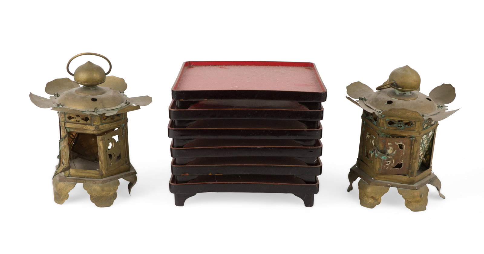 Pair of Chinese Brass Lanterns: Pair of Chinese Brass Lanterns Together with six black and red lacquer footed trays. 8 pieces Lanterns: 9 1/2 x 7 in. (24.1 x 17.8 cm.), Trays: 1 1/2 x 9 1/2 x 9 1/2 in. (3.8 x 24.1 x 24.1 cm.)