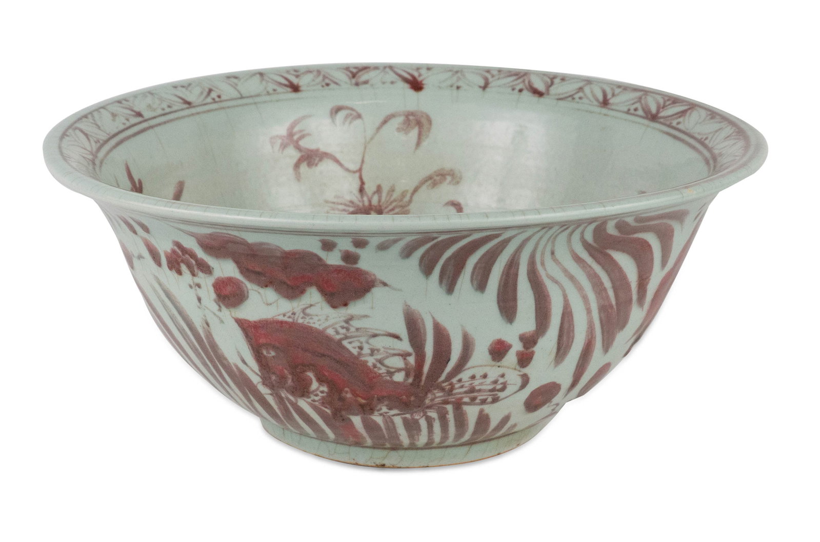 Chinese Copper Red Punch Bowl: Chinese Copper Red Punch Bowl 19th/20th C. decorated with flowers and fish. Crazing. 7 1/4 x 16 1/4 in. (18.4 x 41.3 cm.)
