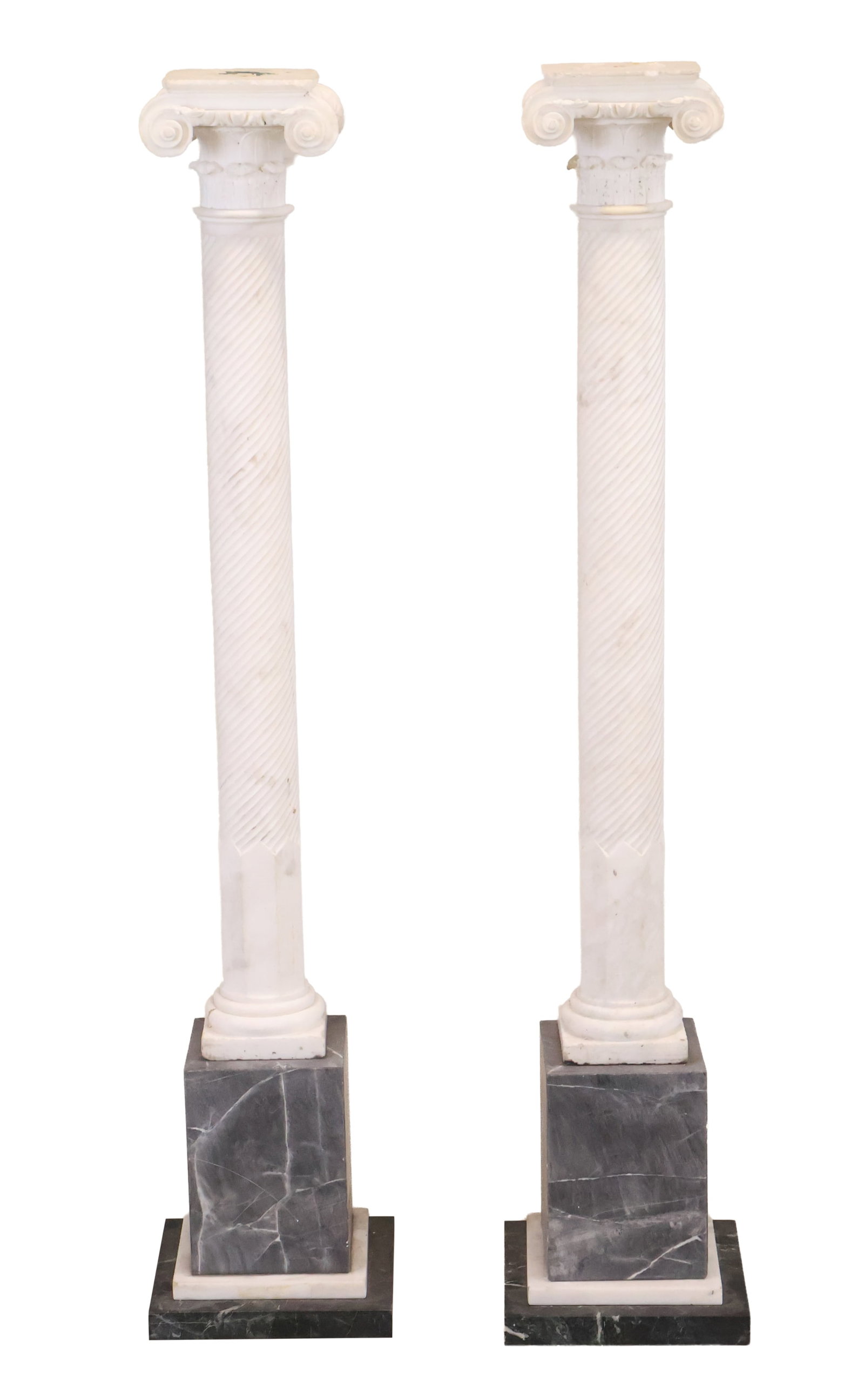 Pair of Carved Marble and Stone Corinthian Columns: Pair of Carved Marble and Stone Corinthian Columns 20th C. Chips, losses and wear. 51 x 10 x 10 in. (129.5 x 25.4 x 25.4 cm.)