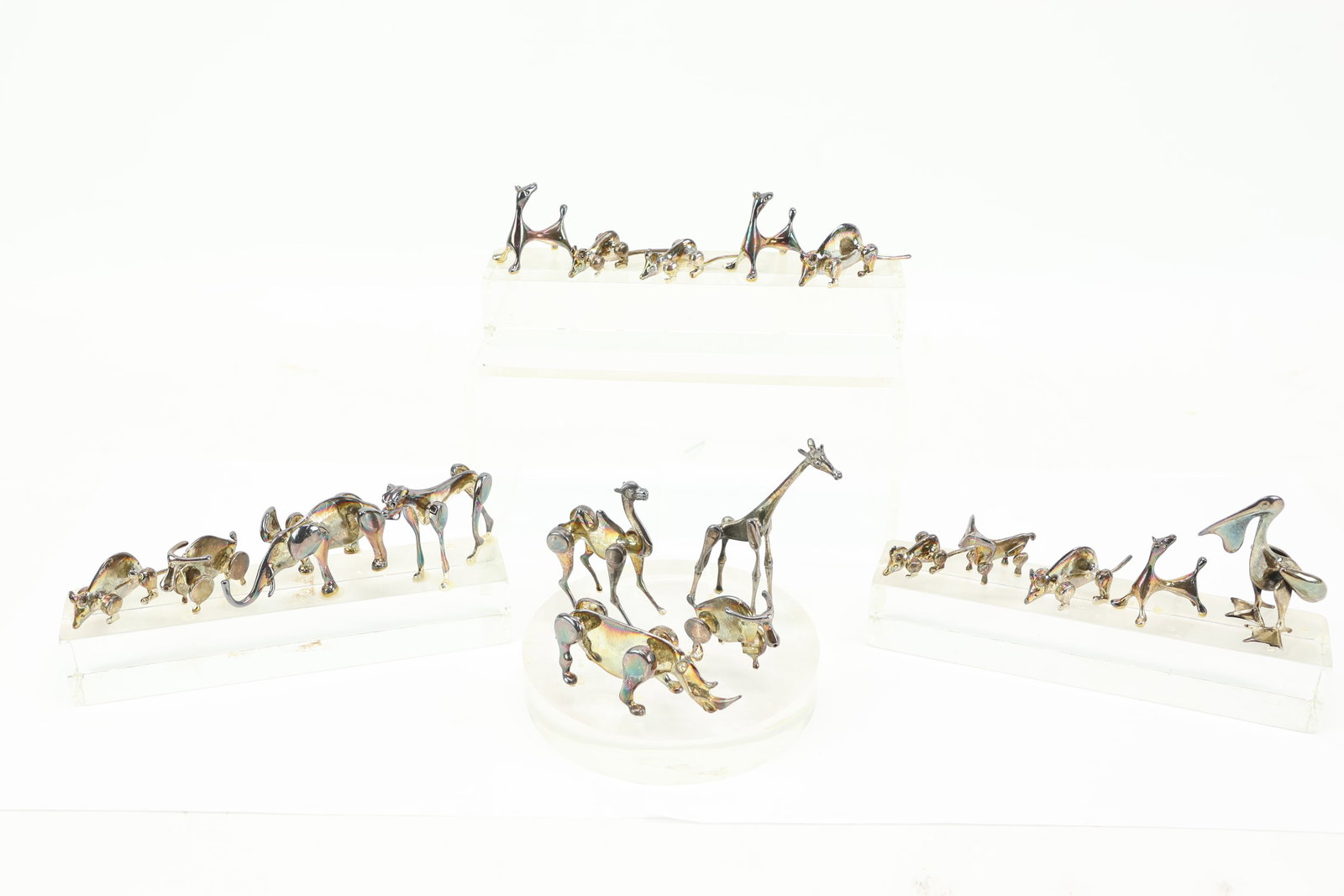 Group of Mid-Century Modern Metal Animal Figurines: Group of Mid-Century Modern Metal Animal Figurines Group of Mid-Century Modern Metal Animal Figurines. Some marked 925, some marked "MOD DEP". with Lucite stands. Used condition, animals are loose
