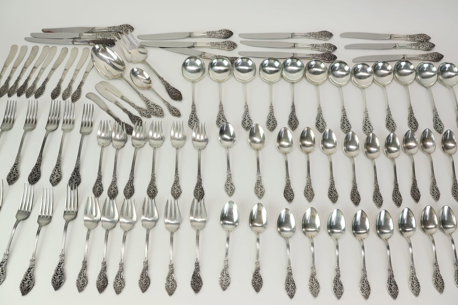Reed and Barton "Florentine Lace" Sterling Silver Flatware: Reed and Barton "Florentine Lace" Sterling Silver Flatware Reed and Barton "Florentine Lace" Sterling Silver Flatware. Comprising, 12 knives, 2 piece salad set, sugar spoon, 12 soup spoons, 24