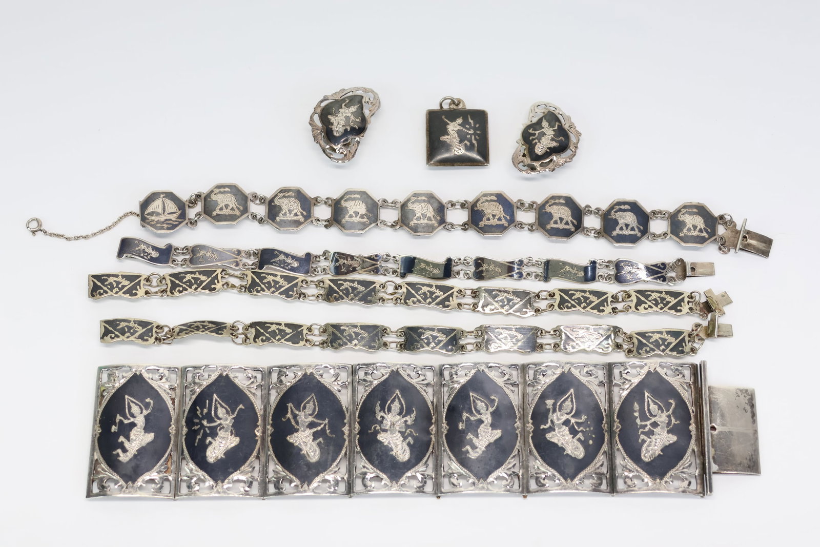Vintage Group of Assorted Siam Sterling Silver Bracelets: Vintage Group of Assorted Siam Sterling Silver Bracelets Vintage Group of Assorted Niello Siam Sterling Silver Deity Bracelets. Comprising of the largest featuring Deities 7" long not including clasp