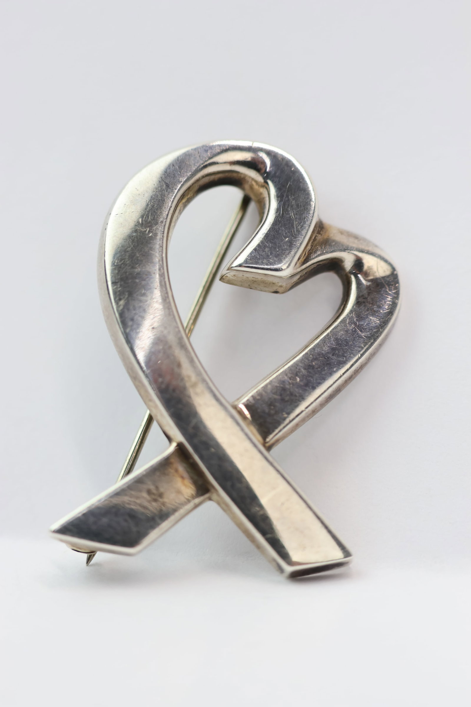 Tiffany & Company Paloma Picasso Sterling Silver Brooch: Tiffany & Company Paloma Picasso Sterling Silver Brooch Tiffany & Company Paloma Picasso Sterling Silver Loving Heart Brooch. Used condition 1 1/4" x 7/8"