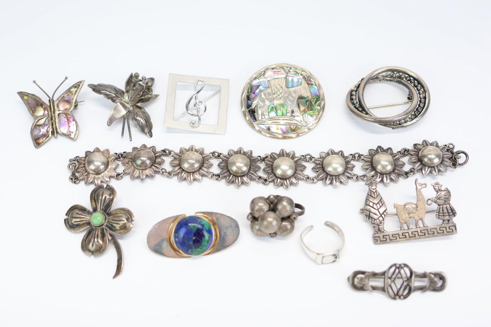 Group of Assorted Sterling Silver Ladies Jewelry: Group of Assorted Sterling Silver Ladies Jewelry Group of Assorted Sterling Silver Ladies Jewelry. Comprising. Vintage Sterling Silver Sunflower Bracelet, Beau Sterling Silver circular beaded brooch,