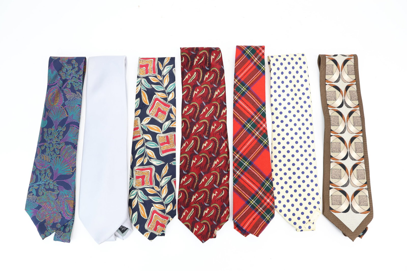 Group of Assorted Silk & Lambswool Men's Neckties: Group of Assorted Silk & Lambswool Men's Neckties Group of Assorted Silk & Lambswool Men's Neckties including a red tartan Lambswool necktie by Rooster, Royal Stewart Scotland, a silk cream and blue