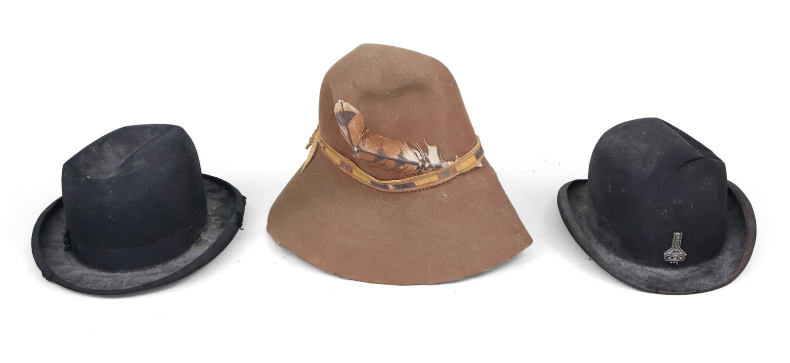 Three Vintage Hats: Three Vintage Hats Comprising, two vintage wool felt fedoras and a black "Longworth" rabbit/beaver felt fedora. Distress, stains, wear, losses. Largest: 9 1/2 x 12 in. (24.1 x 30.5 cm.)