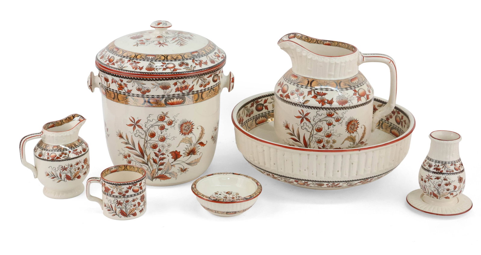 Group of W.T. Copeland & Sons "Wild Flowers" Table Articles: Group of W.T. Copeland & Sons "Wild Flowers" Table Articles Marked W.T. Copeland & Sons, Stoke-on-Trent underside. Comprising, a pitcher, a mug, a soap dish, a caster with underplate, an ice bucket,