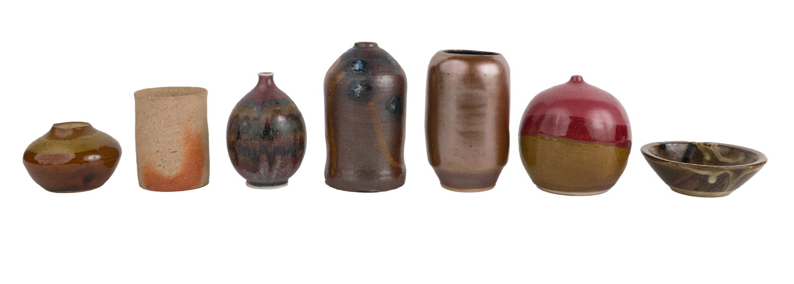 Seven Small Art Pottery Table Articles: Seven Small Art Pottery Table Articles Including, vases and a bowl, some signed. Largest: 5 3/4 x 3 1/2 in. (14.6 x 8.9 cm.)