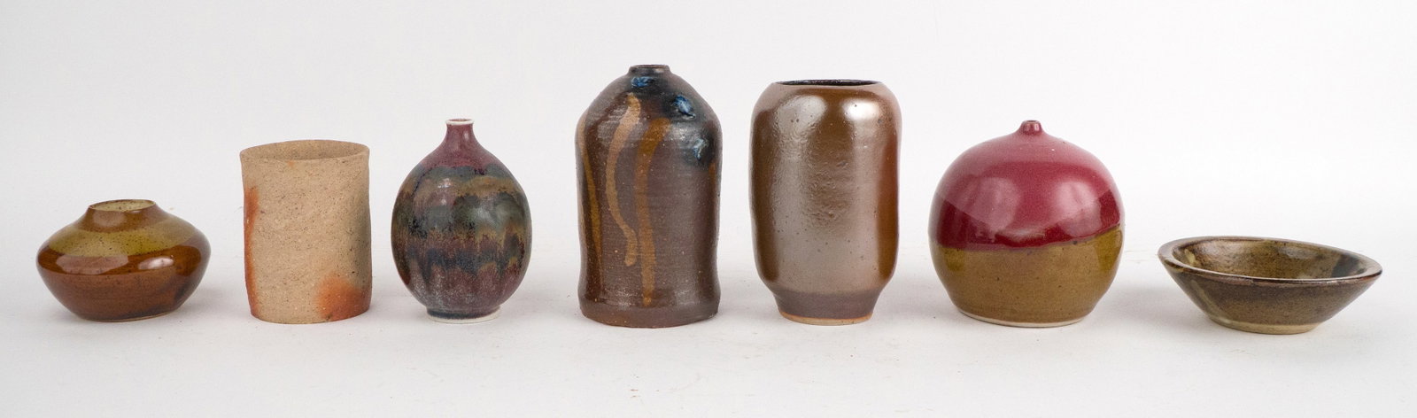 Seven Small Art Pottery Table Articles - 7