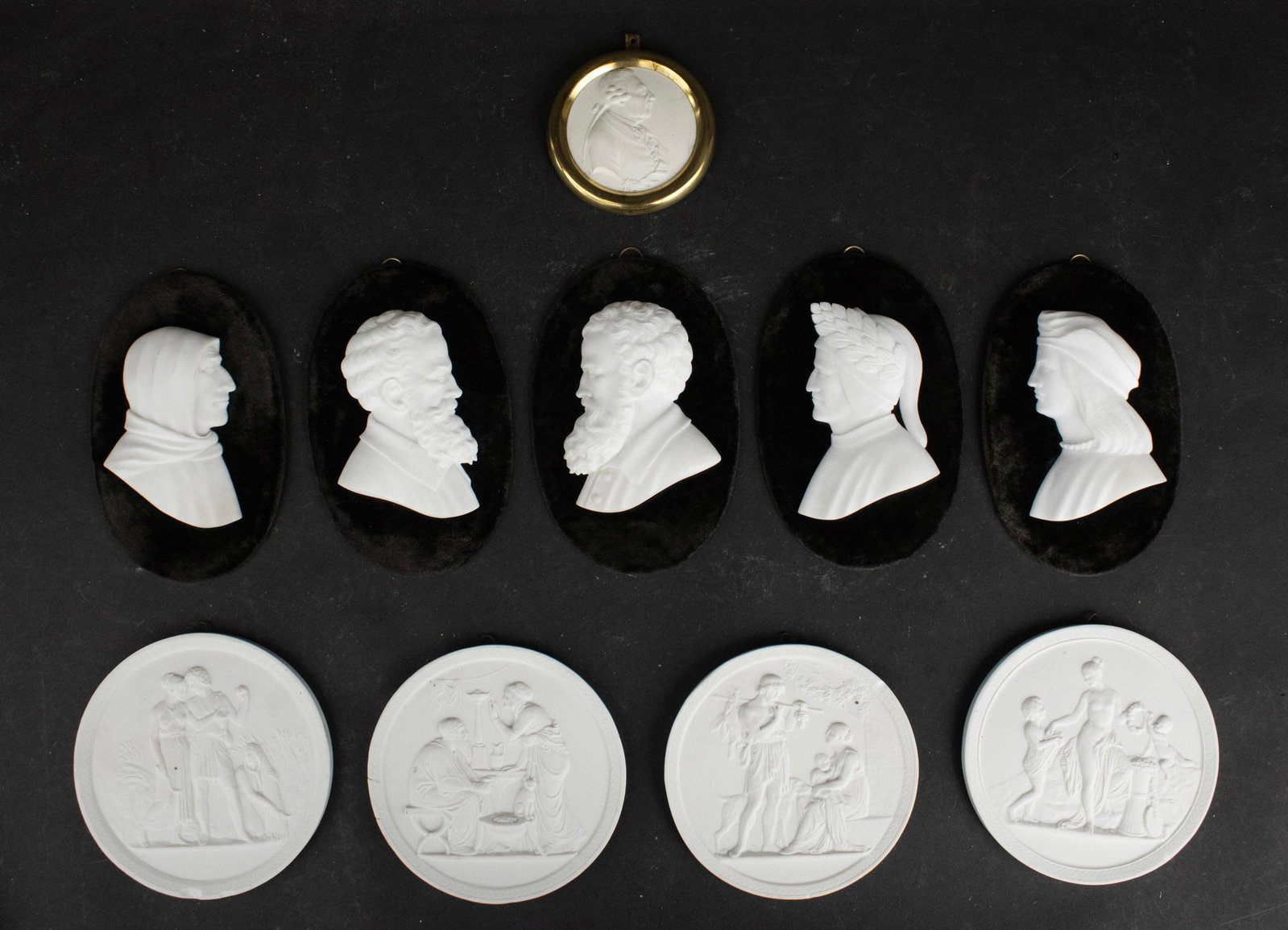 Royal Copenhagen Bisque Plaques of the Four Seasons: Royal Copenhagen Bisque Plaques of the Four Seasons Together with 5 Antonio Frilli bisque profiles of Renaissance artists and authors mounted on velvet and a bisque plaque of Frederick the Great. 10