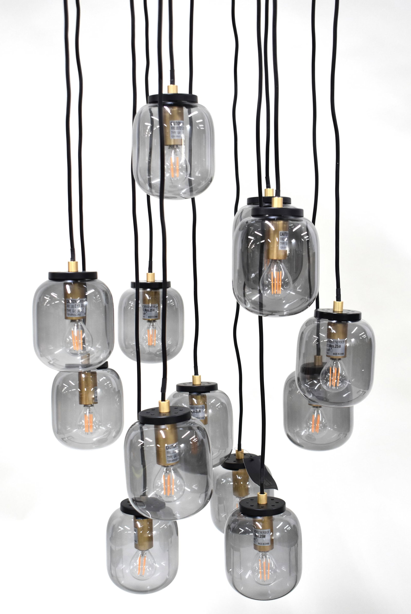 Dome Deco Modern 13-Drop Smoked Glass Chandelier: Dome Deco Modern 13-Drop Smoked Glass Chandelier Dome Deco Modern 13-Drop Smoked Glass Chandelier from the Cosmopolitan Living line, featuring a large black canopy with 13 drop lights of adjustable le
