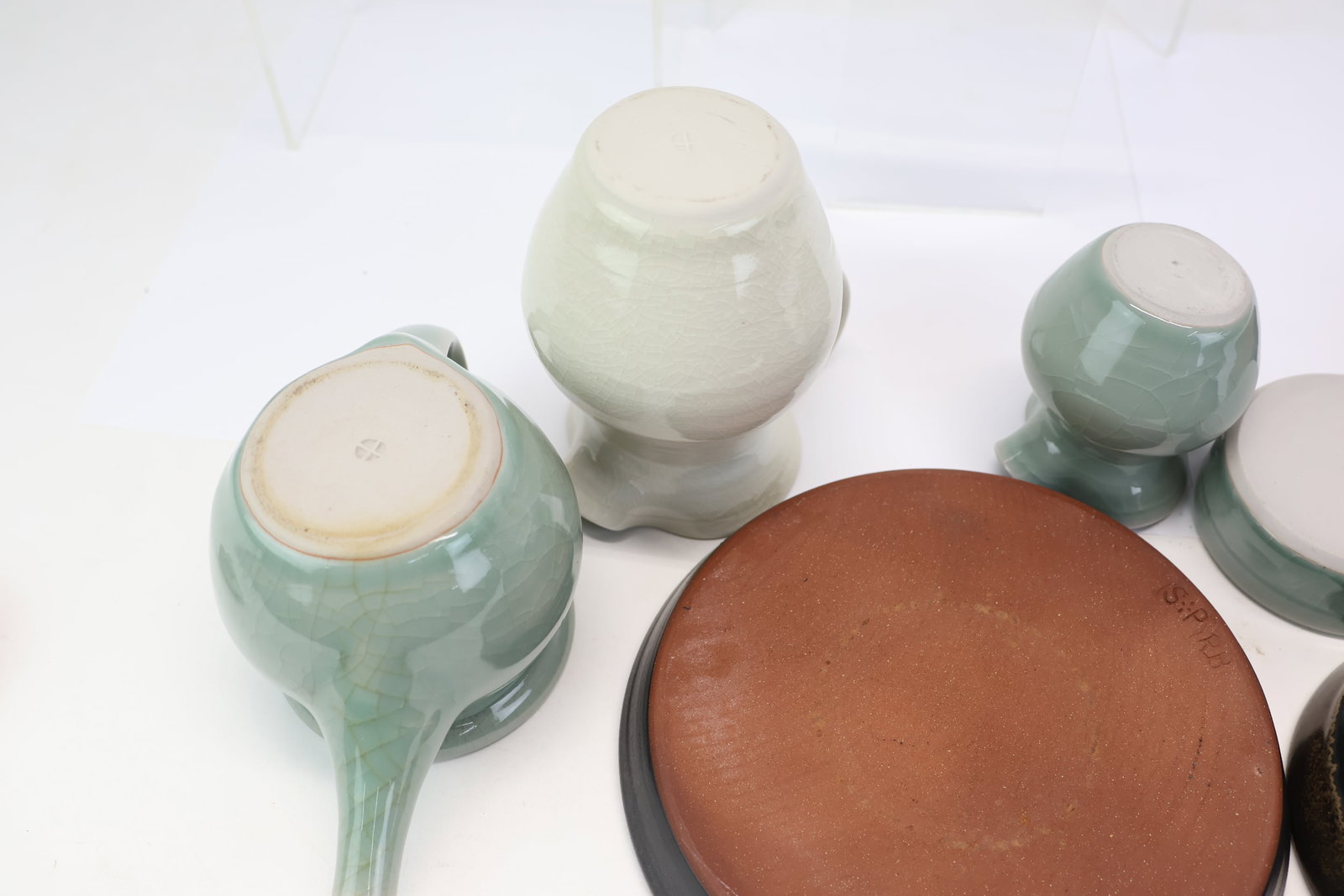 Seven Simon Pearce Glazed Pottery Table Articles - 9