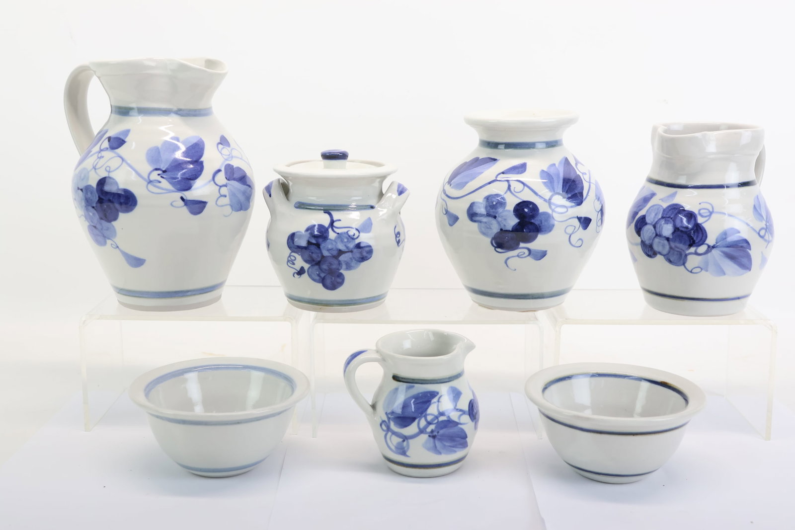 Seven Miranda Thomas for Simon Pearce "Grapevine" Table Articles: Seven Miranda Thomas for Simon Pearce "Grapevine" Table Articles Seven Miranda Thomas for Simon Pearce "Grapevine" Table Articles. Comprising, two pitchers, a creamer, a vase, two bowls, and a sugar