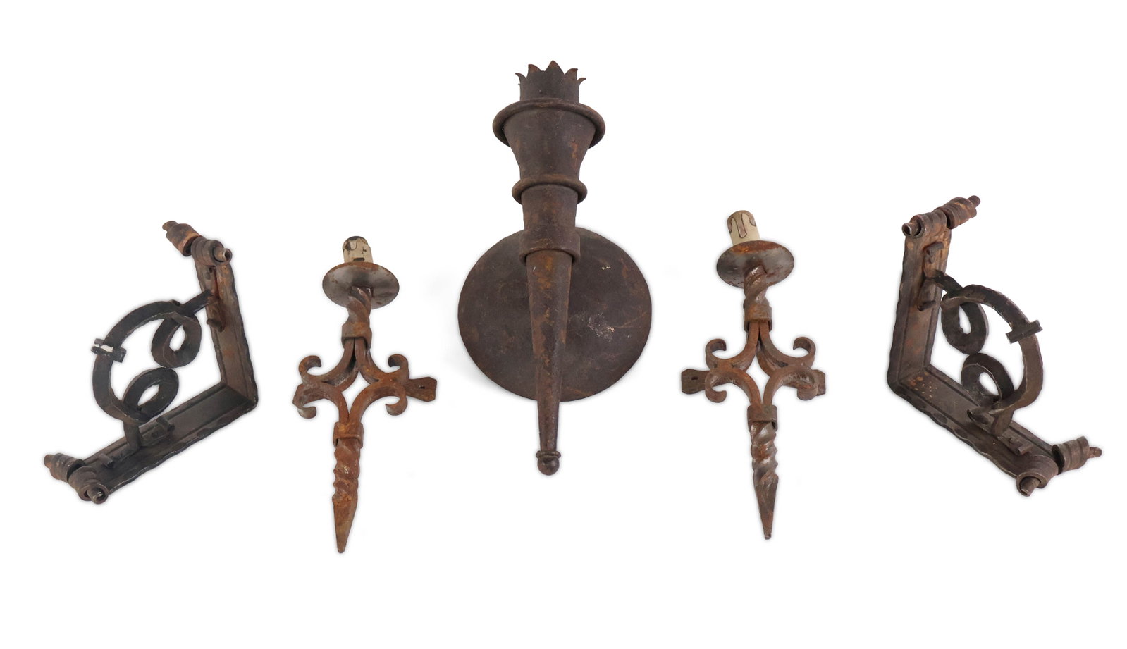 Pair of Baroque Style Cast-and-Wrought Iron Brackets: Pair of Baroque Style Cast-and-Wrought Iron Brackets Together with a cast and wrought iron torch form wall sconce, and a pair of wrought-iron wall sconces. 5 pieces Rust, wear, surface distress.