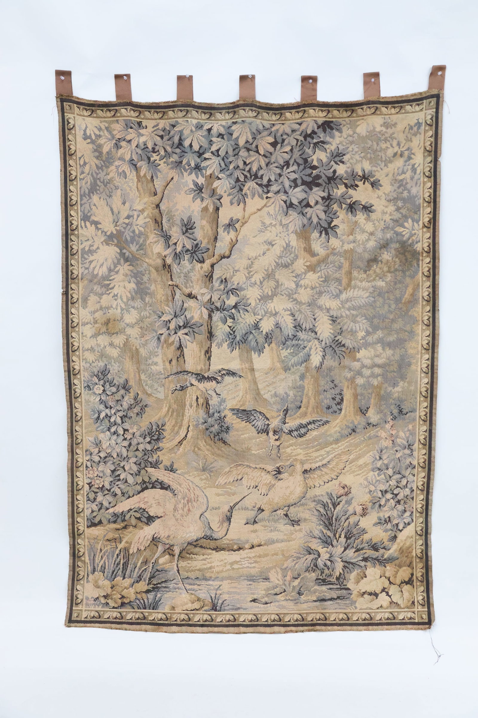 Vintage Aubusson Style Verdure Tapestry: Vintage Aubusson Style Verdure Tapestry Vintage Aubusson Style Verdure Tapestry featuring heron, swan, and ducks at streamside, in a wooded landscape. Used condition, wear, worn, losses, stains,