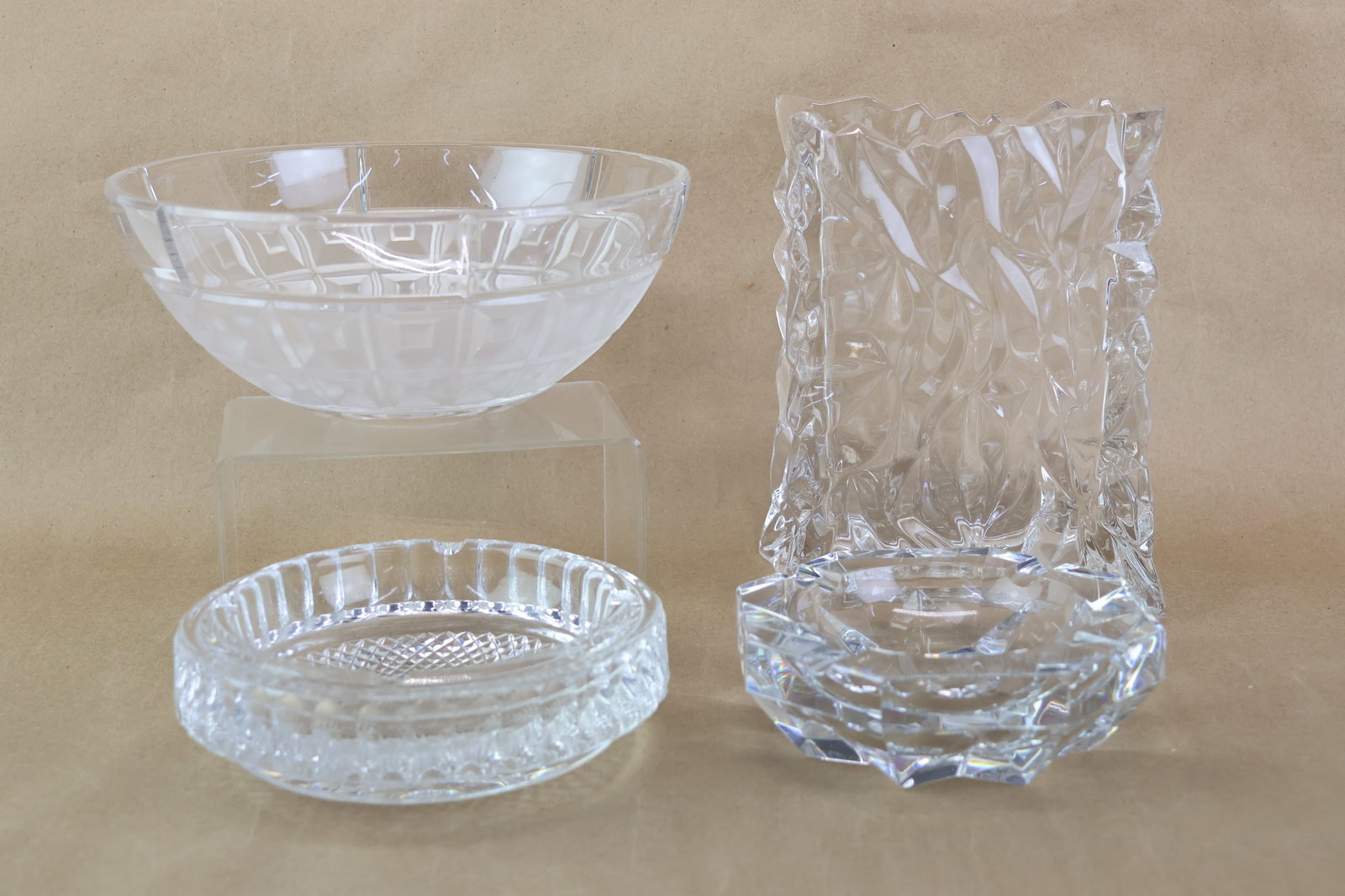 Group of Baccarat and Rosenthal Colorless Glass: Group of Baccarat and Rosenthal Colorless Glass Group of Baccarat and Rosenthal Colorless Glass Lot of 4 items include two crystal cut ashtrays: One marked Baccarat and measures 5 7/8" diameter x 2".