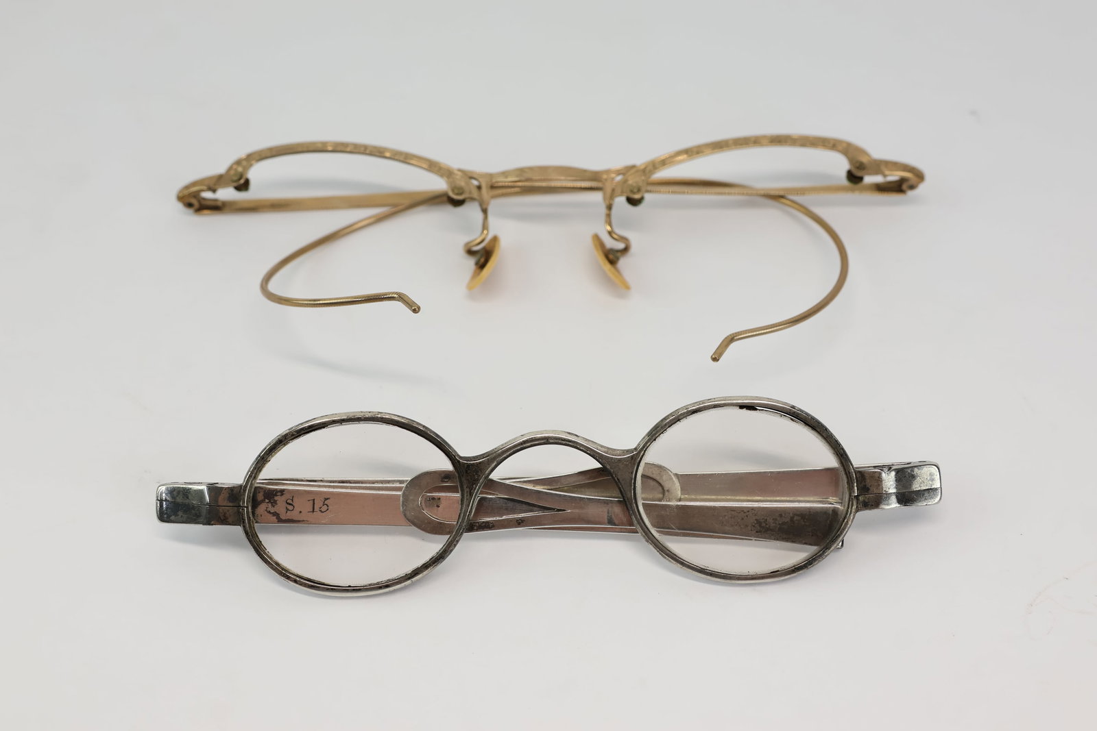 Antique Reading Spectacles Eye Glasses: Antique Reading Spectacles Eye Glasses Antique Reading Spectacles. One having silver tone old-fashioned oval framed reading glasses includes eyeglass case. Together with set of gold filled eye