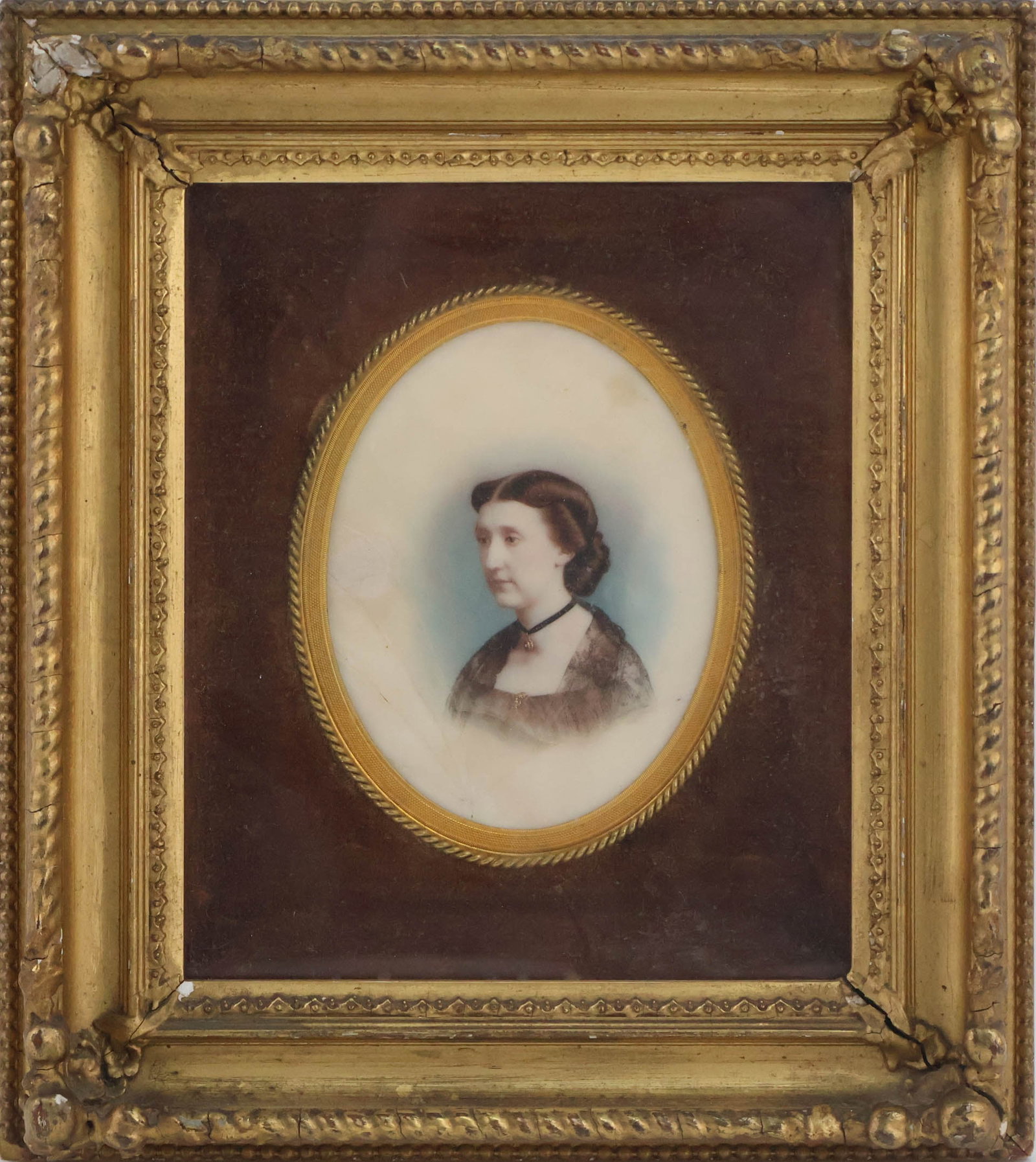 Portrait Miniature of a Woman: Portrait Miniature of a Woman Mounted in a shadowbox gilt frame. Cracks. Provenance: Rhode Island Estate: Thence By Descent Sight: 4 1/2 x 3 1/2 in. (11.4 x 8.9 cm.), Frame: 10 1/4 x 9 in. (26 x 22.9