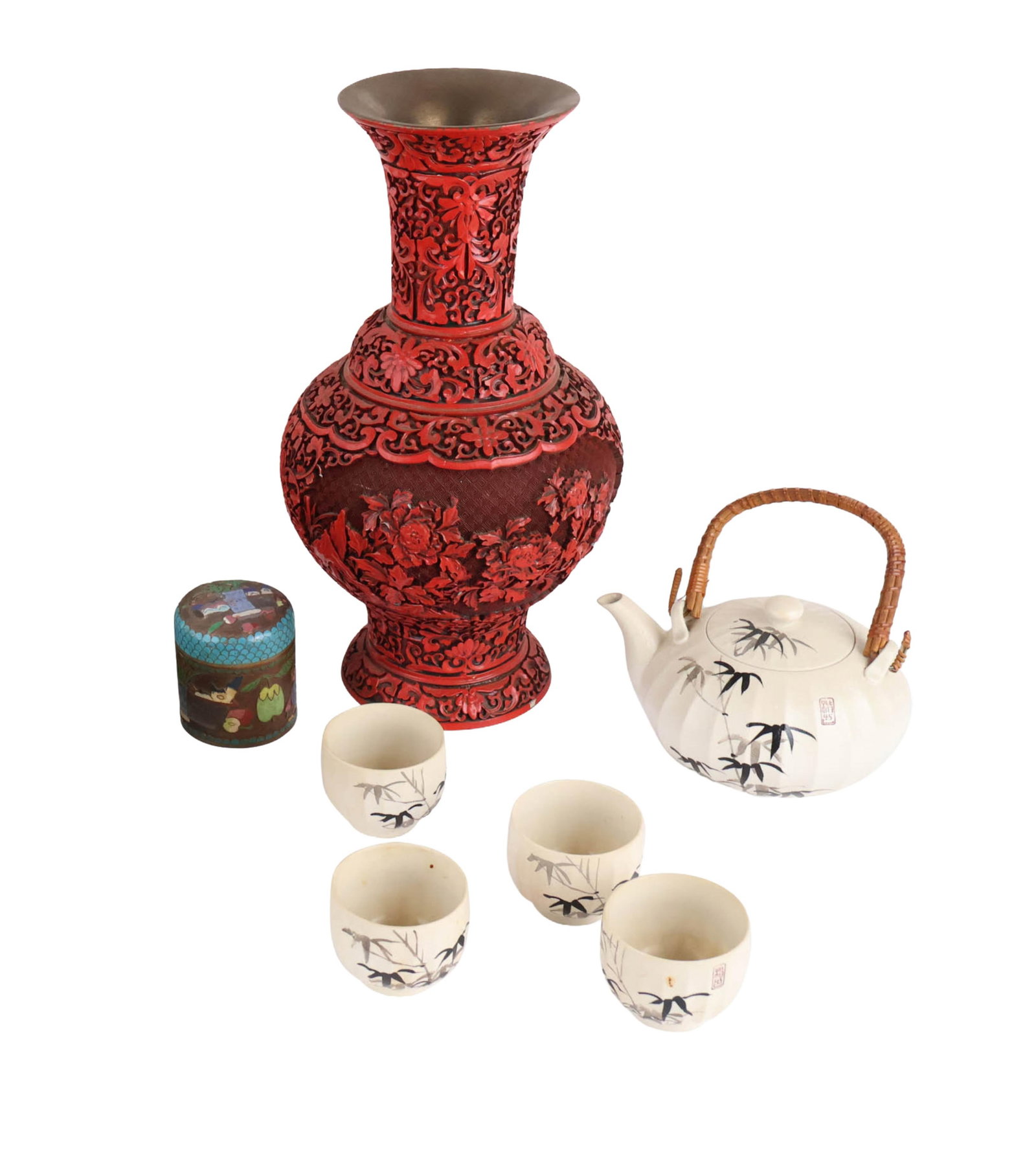 Chinese Cinnabar Vase: Chinese Cinnabar Vase 20th C. Together with a Chinese porcelain teapot and four teacups, and a enamel covered jar. 7 pieces Chips, losses, surface distress. Vase: 15 1/4 x 8 1/2 in. (38.7 x 21.6 cm.)